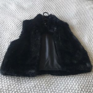 Black faux fur vest